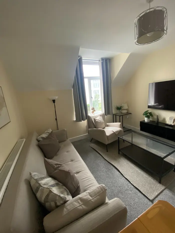 Short-let lounge tidied and cleaned between guests