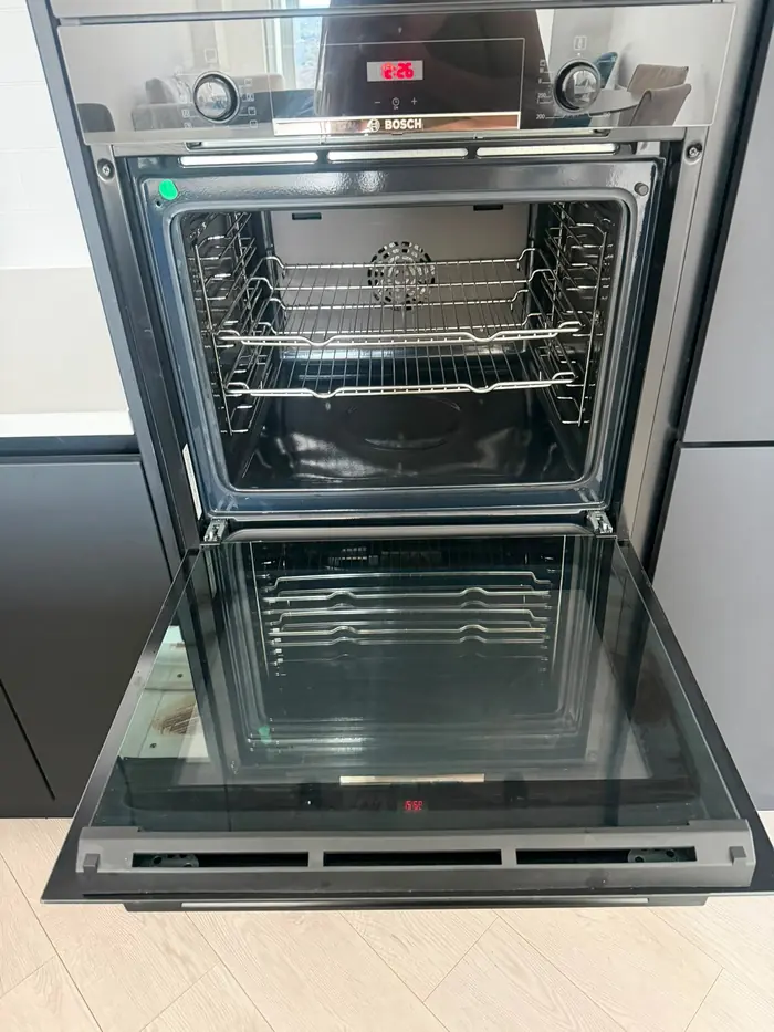 Oven cleaned inside with racks and glass door spotless