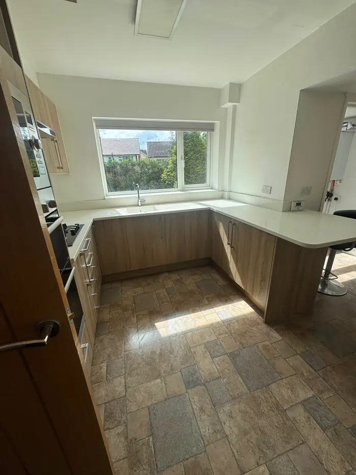 Family kitchen with tiled floor cleaned for move-out
